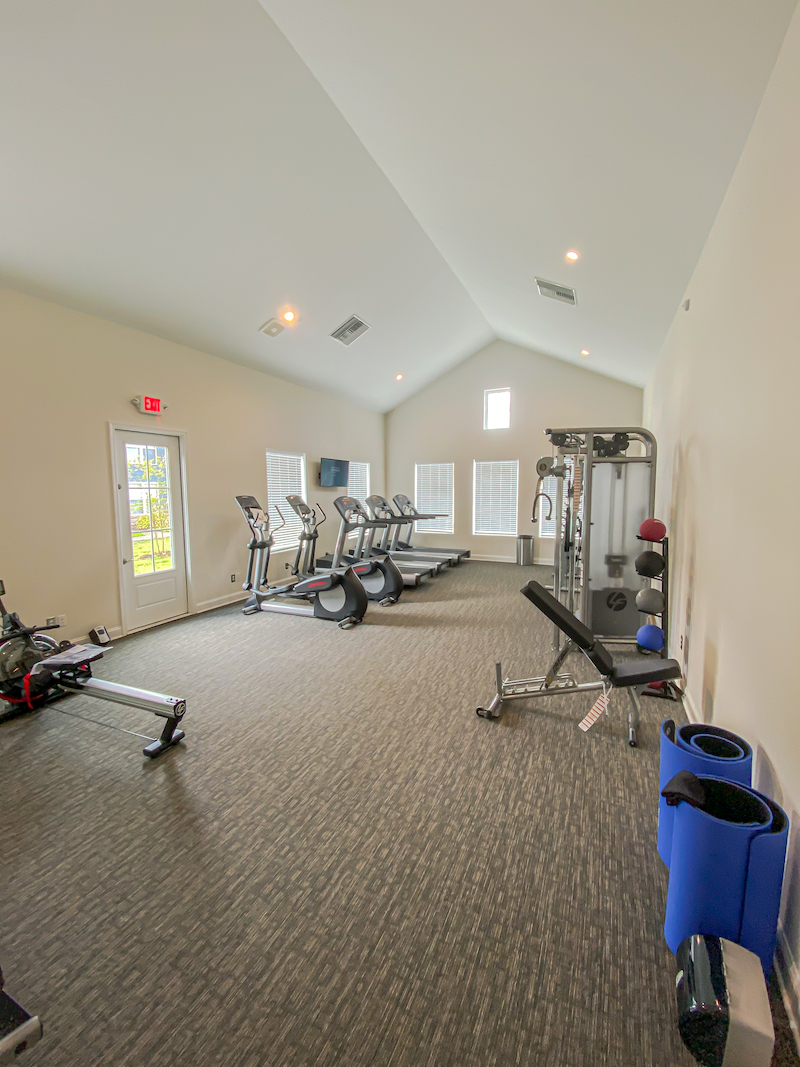 Fitness room with various exercise equipment
